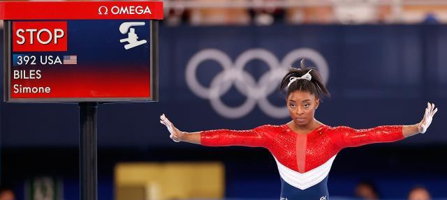 爱游戏平台-美媒：拜尔斯肩负重压 运动员心理健康问题被忽视